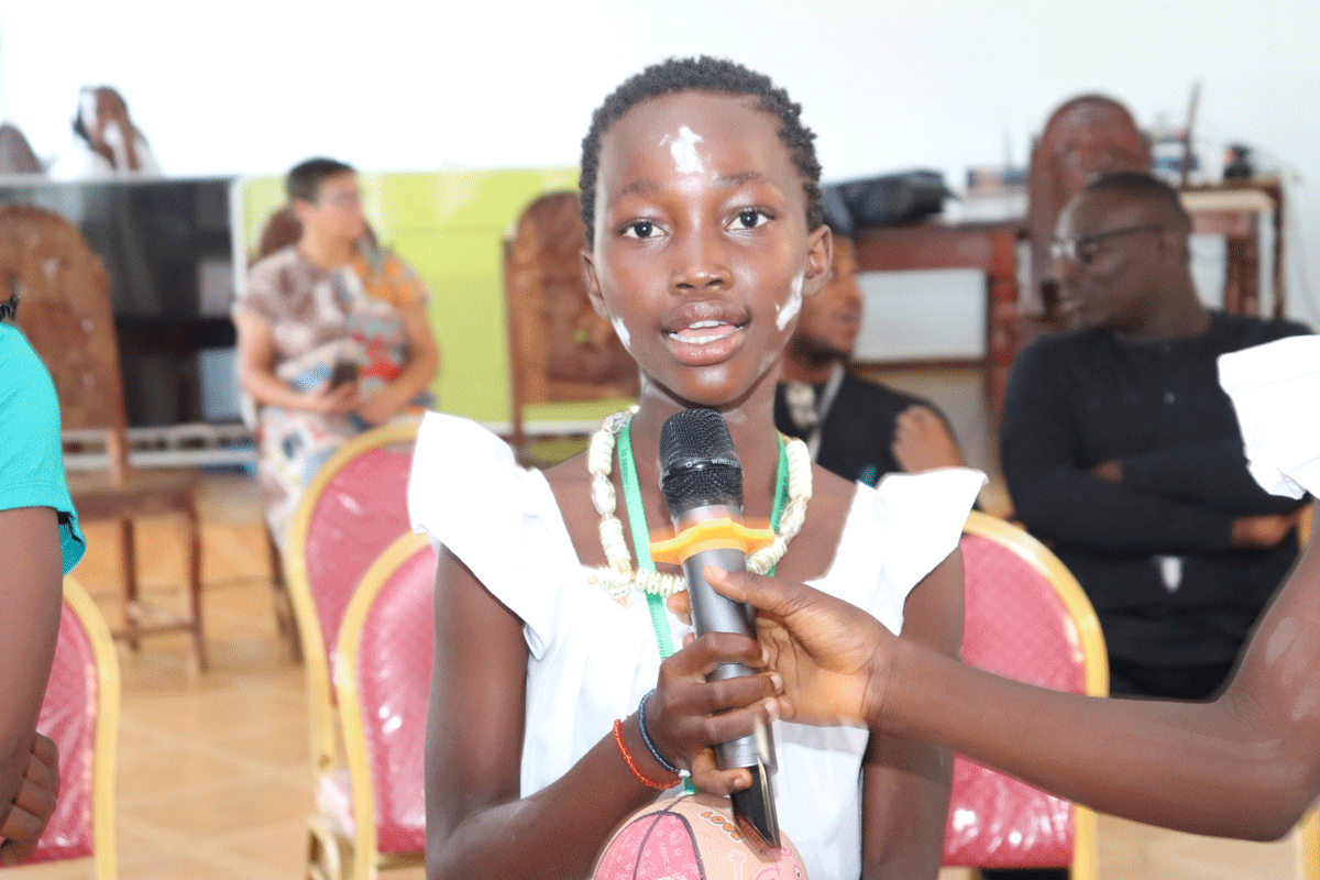 A young person speaking at the Adolescent Girls Summit for French-speaking youth