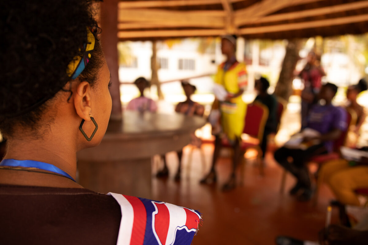 Girl listening at AGS activity